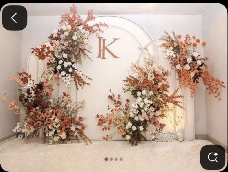 Monogram arched backdrop — rust + peach